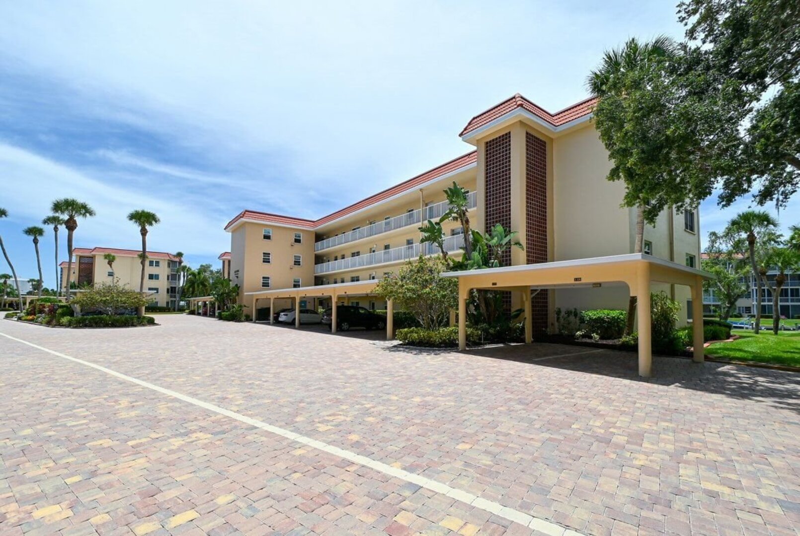 Exterior of building with covered parking